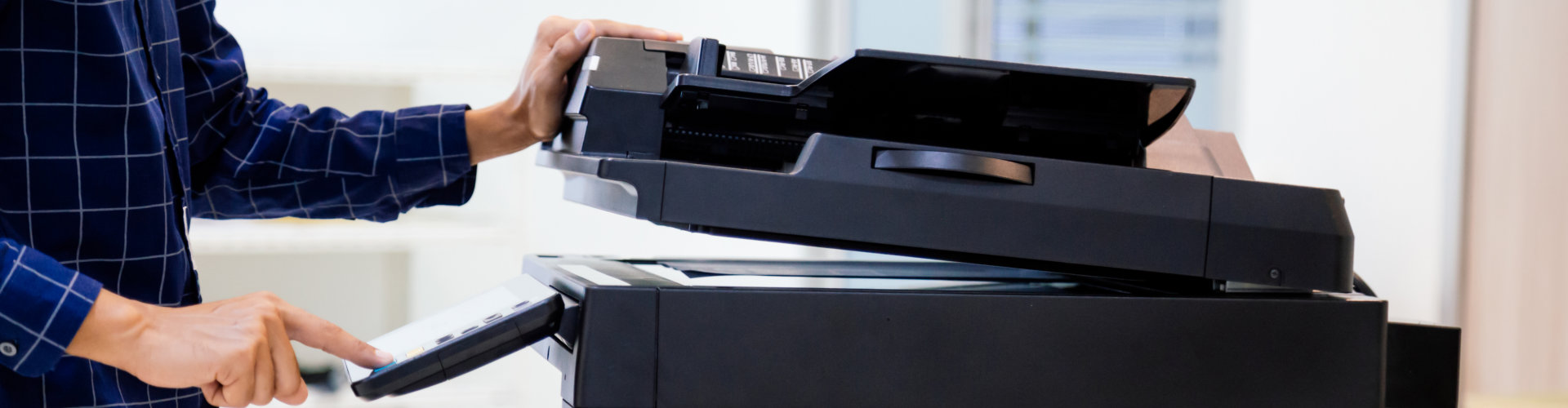 man using photocopier or printer